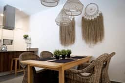 Lunada: Bright Stay with Rooftop Amenities - Image 4
