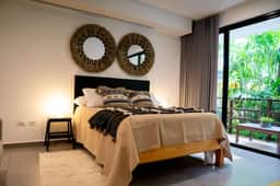 Lunada: Bright Stay with Rooftop Amenities - Image 3