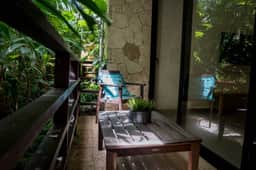 Lunada: Bright Stay with Rooftop Amenities - Image 5