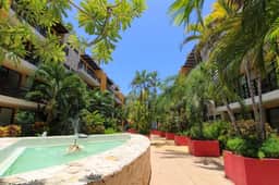 Lunada: Bright Stay with Rooftop Amenities - Image 2