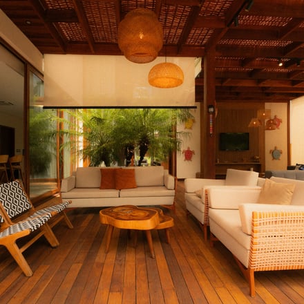 Tropical living area with warm tones and natural materials